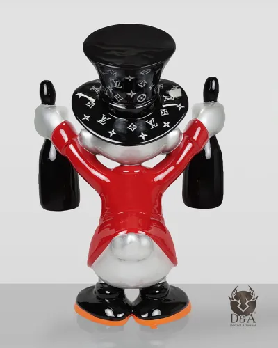 Paperon de' Paperoni in un abito Louis Vuitton e champagne rosso