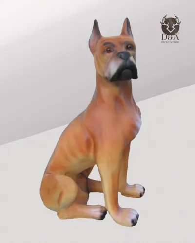 Dieren | Realistisch zittend Boxerbeeldje van hars
