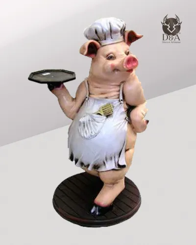 Realistic resin statue of a waiting pig