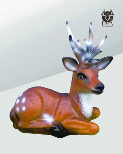 Realistic reclining fawn resin statue