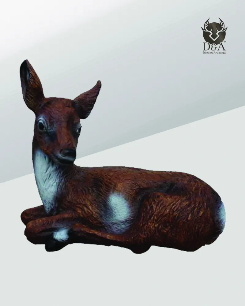 Realistic reclining doe resin statue