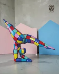 Statua in resina di un'acrobata, dal design multicolore, ideale per il tuo arredamento.
